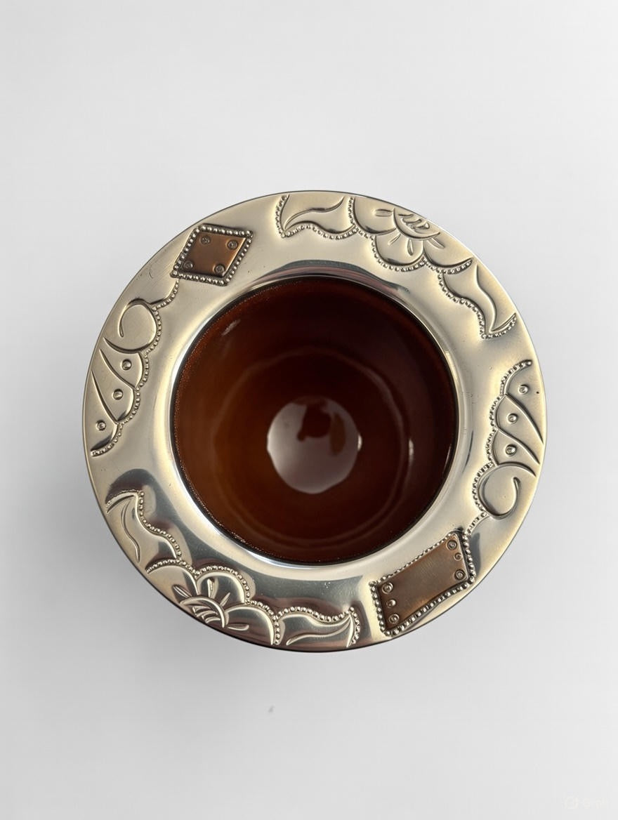 Top view of the brown Mate Imperial ceramic cup with ornate engraved rim