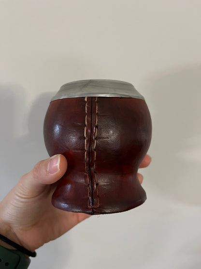 Back of the brown calabash mate cup from the Starter Kit, showing the stitched leather seam
