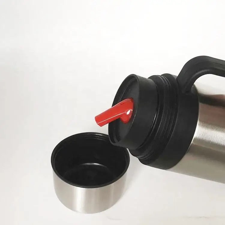 Thermos pouring into cap